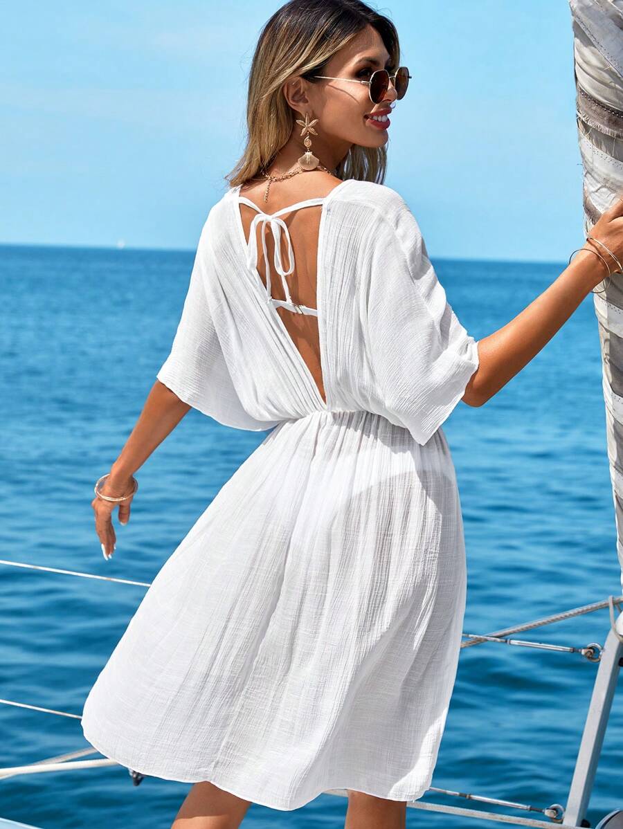 Deep V-neck beach cover-up with batwing sleeves