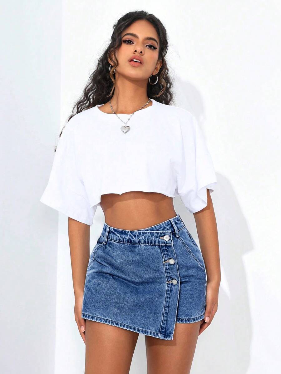 Mini-jupe en jean taille haute avec bouton sur le devant pour femme