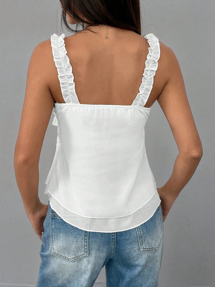 Chic coquette top i blonder patchwork med flæsekant og lagdelt design