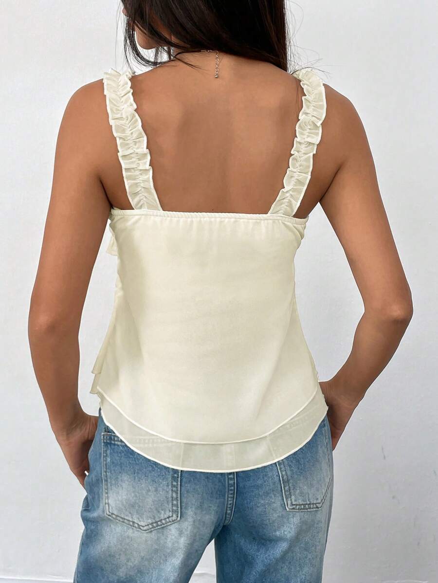 Chic coquette top i blonder patchwork med flæsekant og lagdelt design