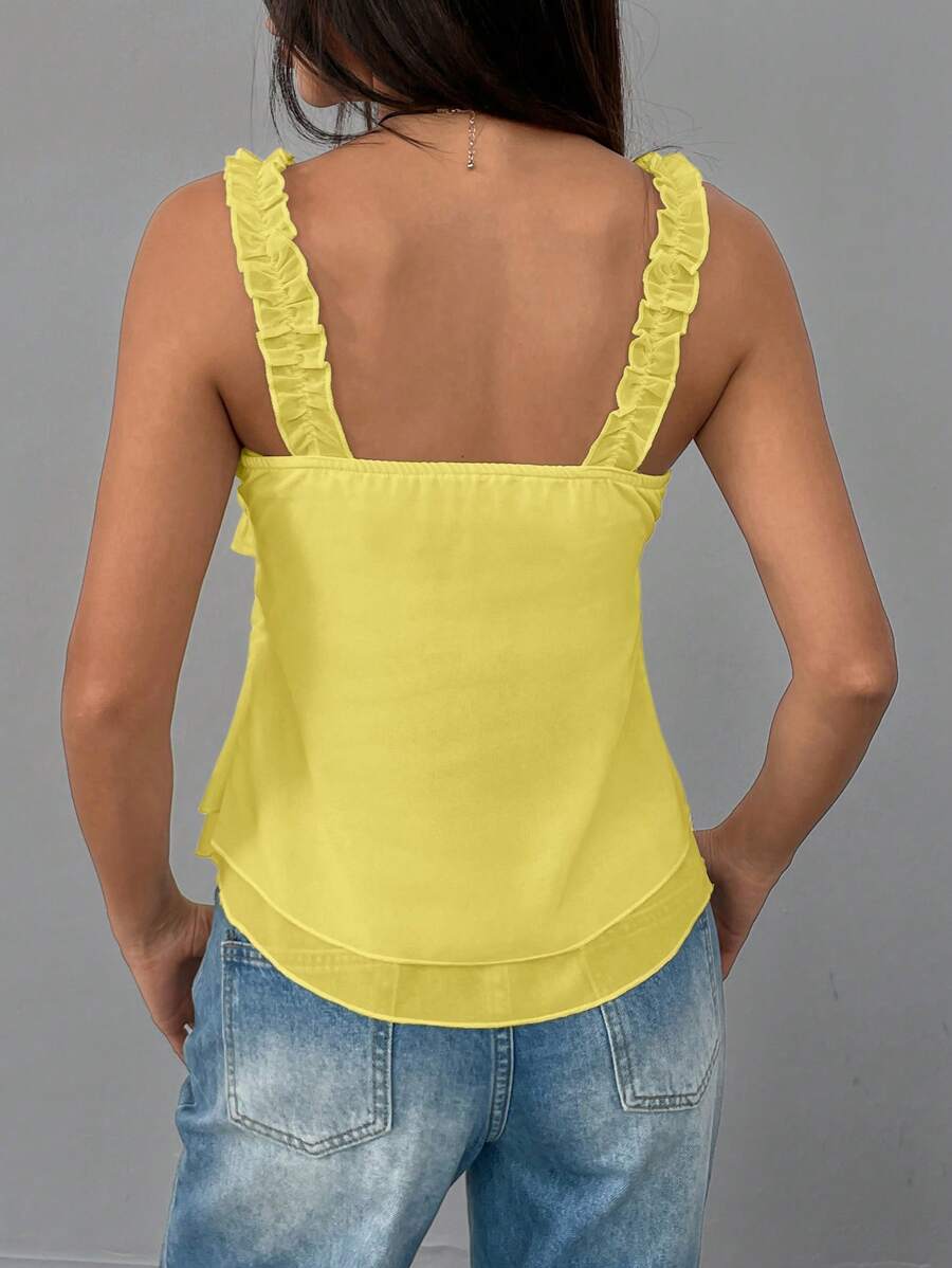 Chic coquette top i blonder patchwork med flæsekant og lagdelt design