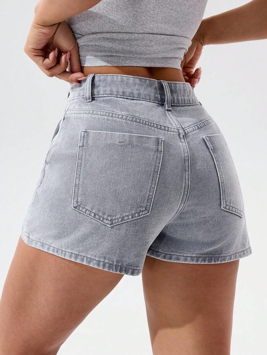 Mini-jupe en jean taille haute avec bouton sur le devant pour femme