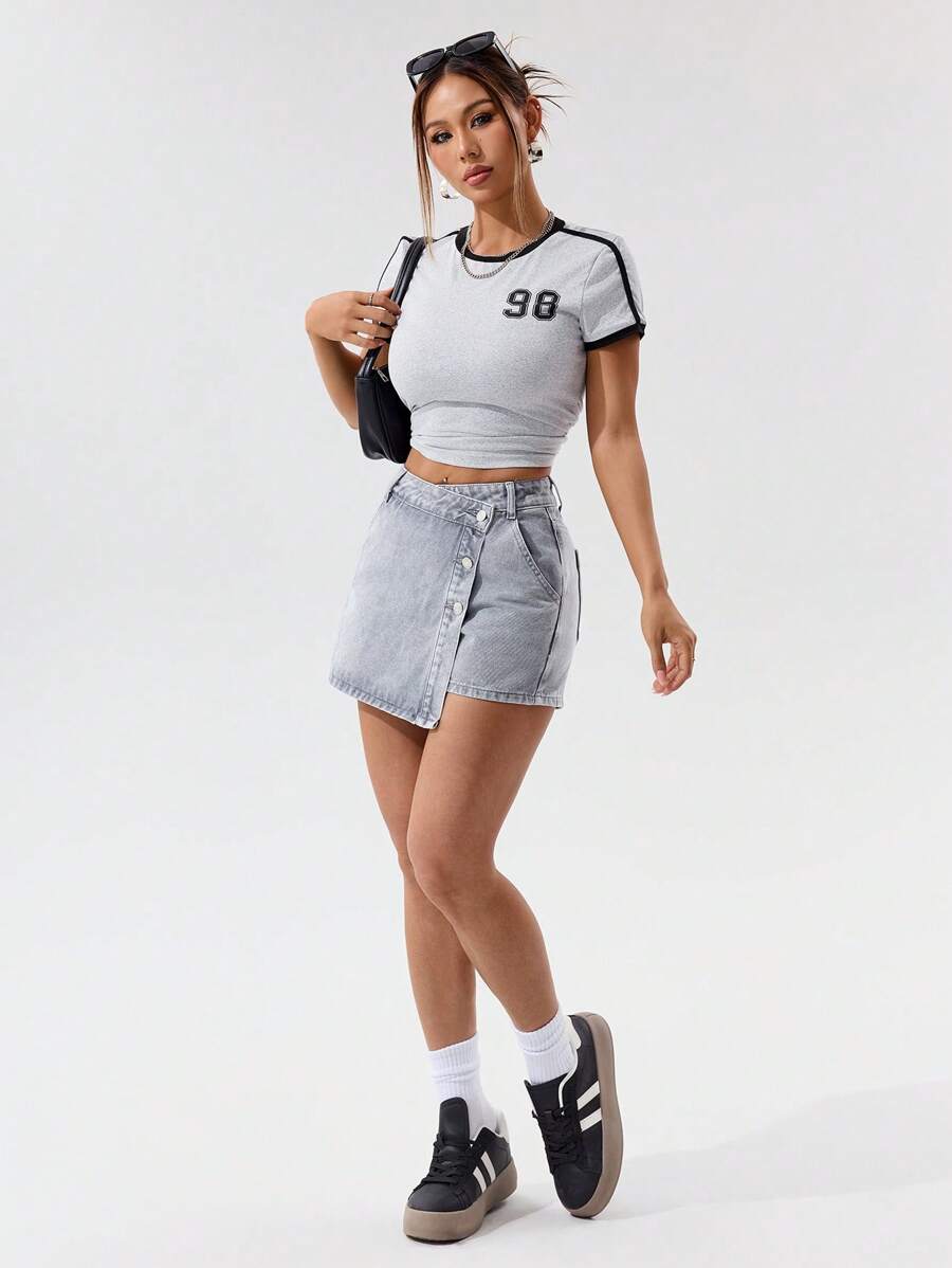 Mini-jupe en jean taille haute avec bouton sur le devant pour femme