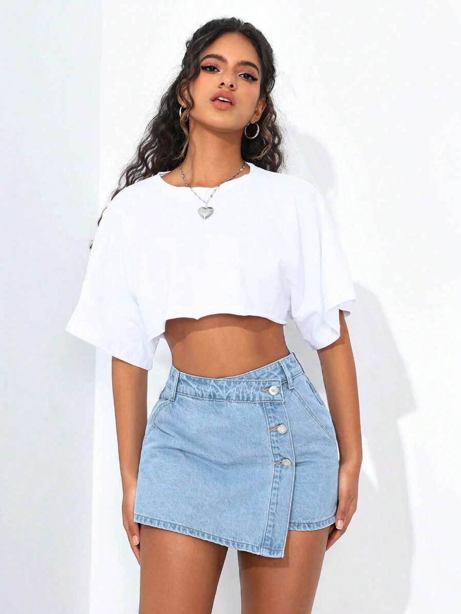 Mini-jupe en jean taille haute avec bouton sur le devant pour femme