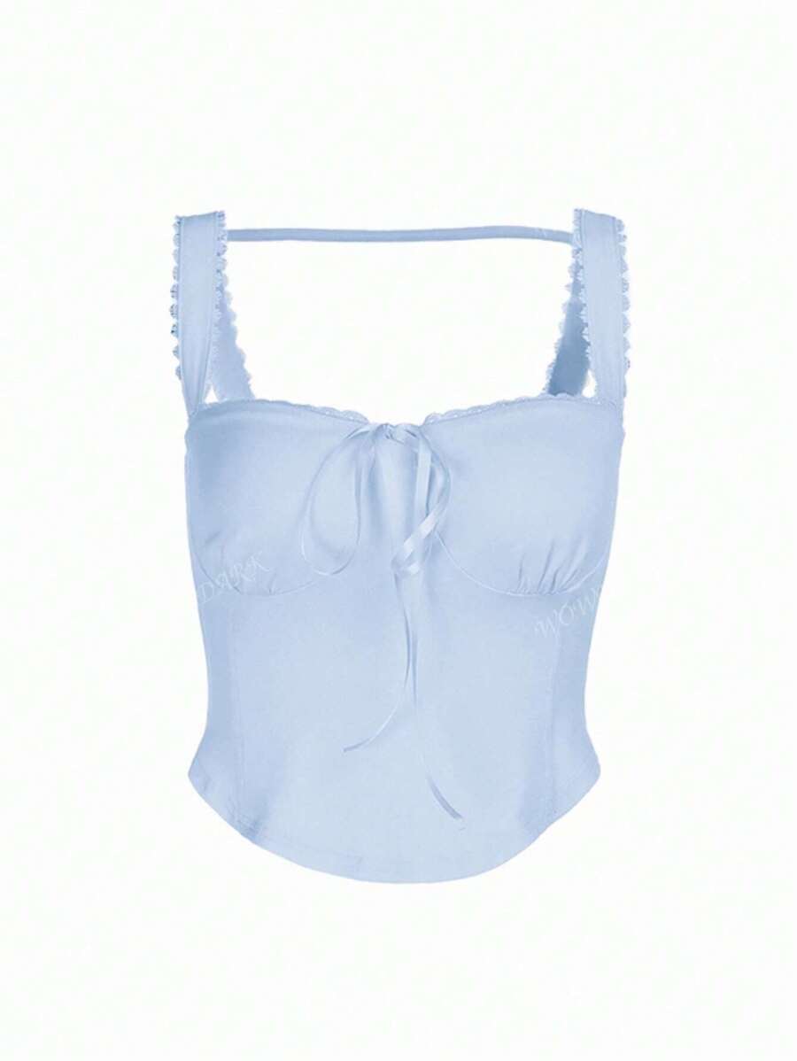 Haut coquette en dentelle avec lien sur le devant et design style corset