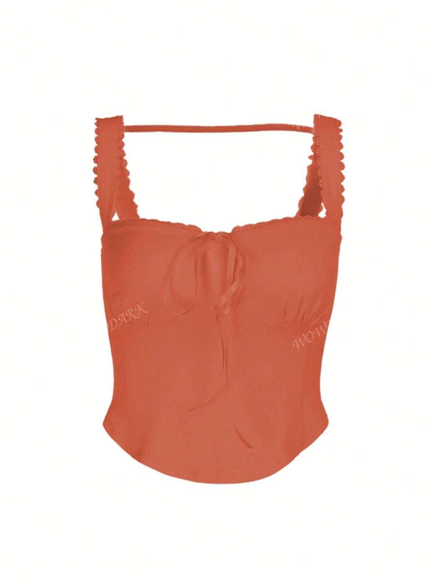 Haut coquette en dentelle avec lien sur le devant et design style corset