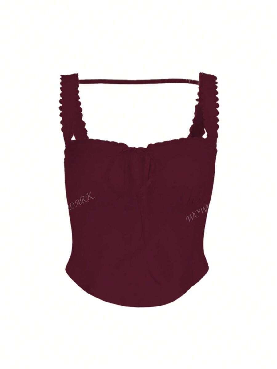 Haut coquette en dentelle avec lien sur le devant et design style corset