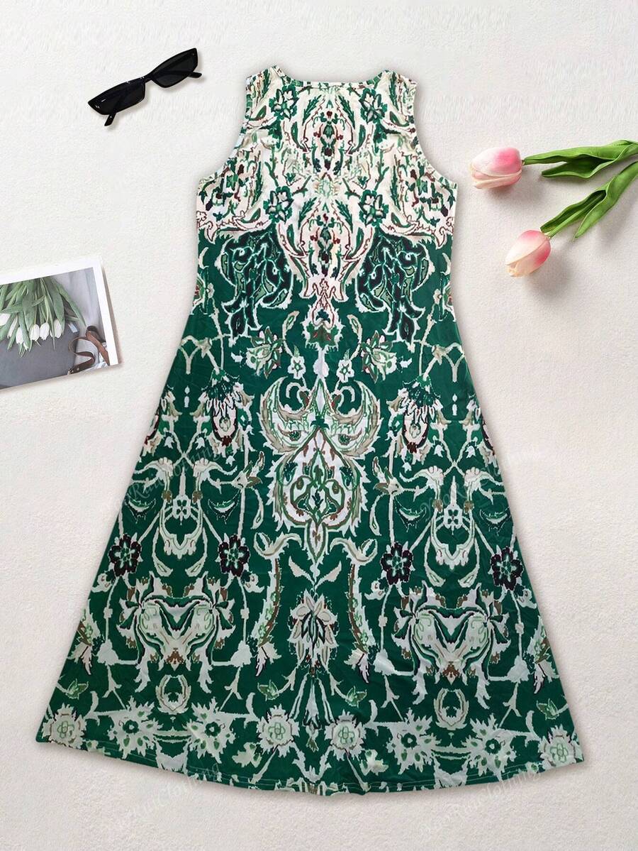 Elegant blomstrede midi kjole med print, let til ferie og sommer