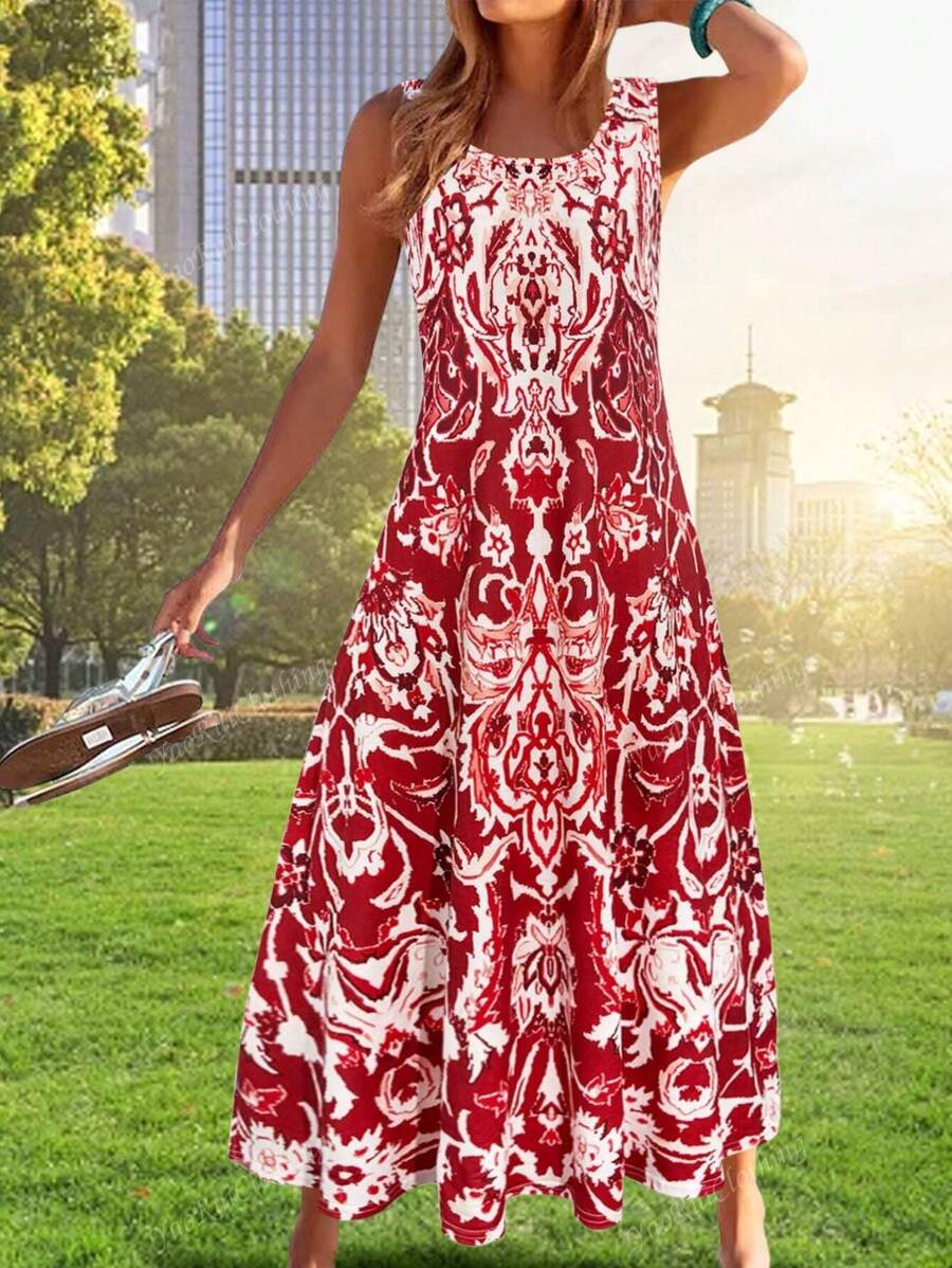 Elegant blomstrede midi kjole med print, let til ferie og sommer