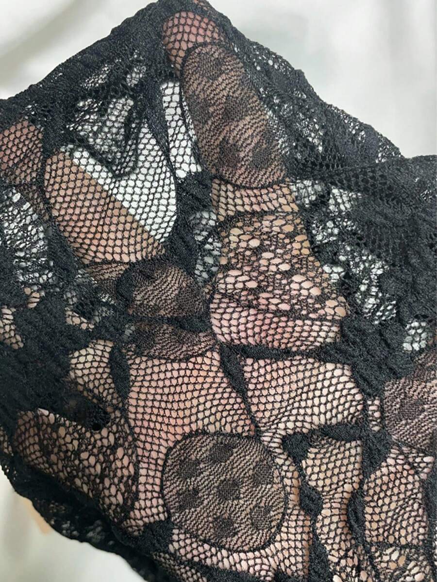 Short asymmetrical transparent mesh top with long sleeves for women