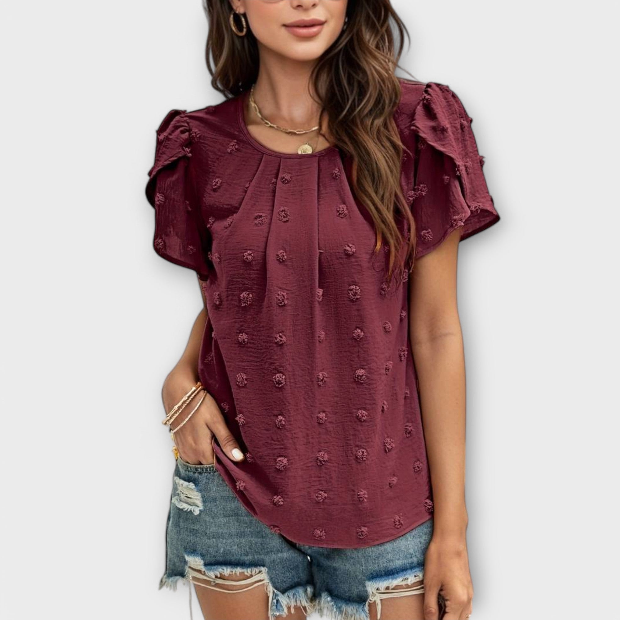 Blouse à pois et manches fleuries – Élégance féminine chic