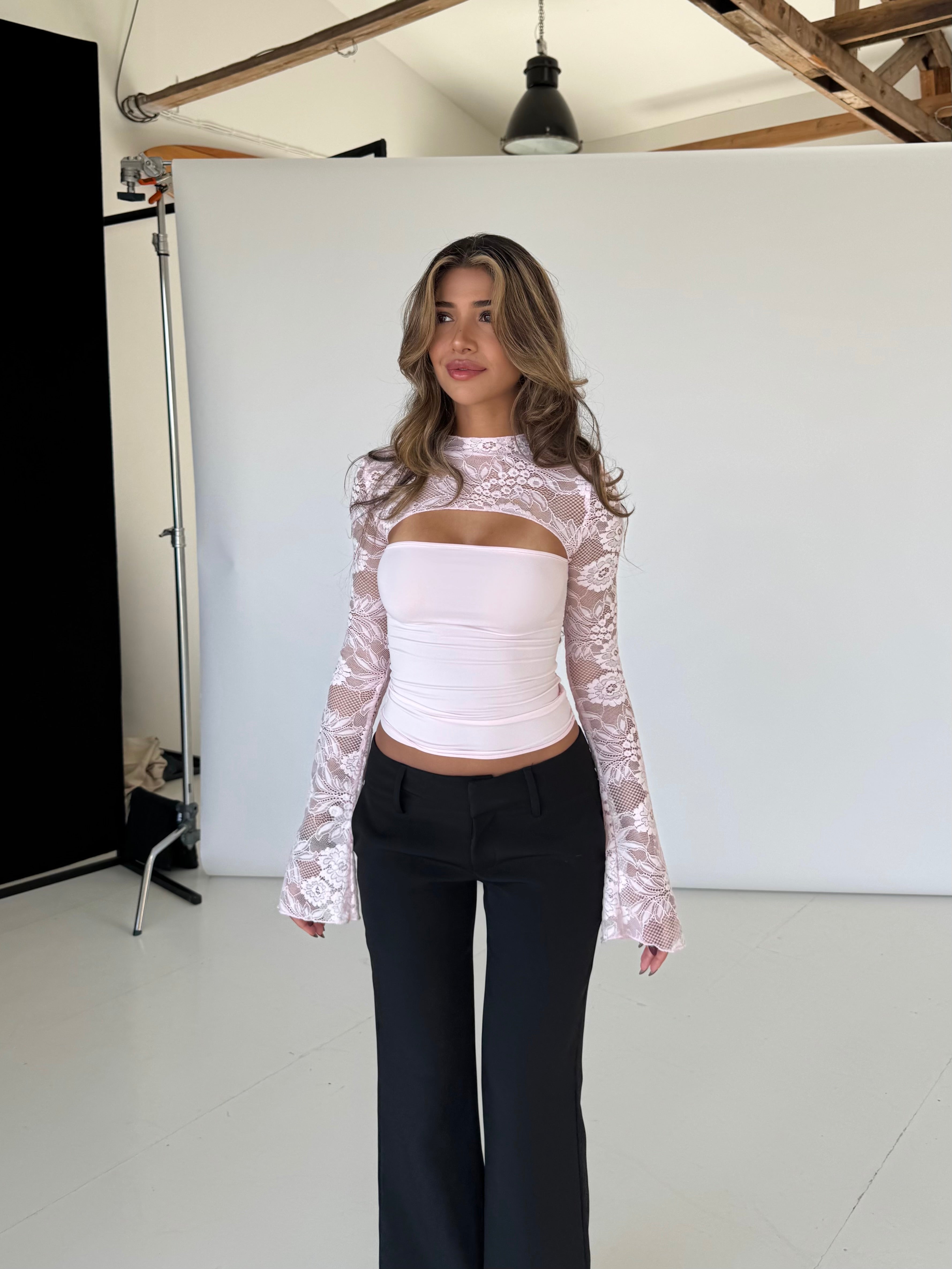 Flirty long-sleeve top in cut lace with a romantic fitted design