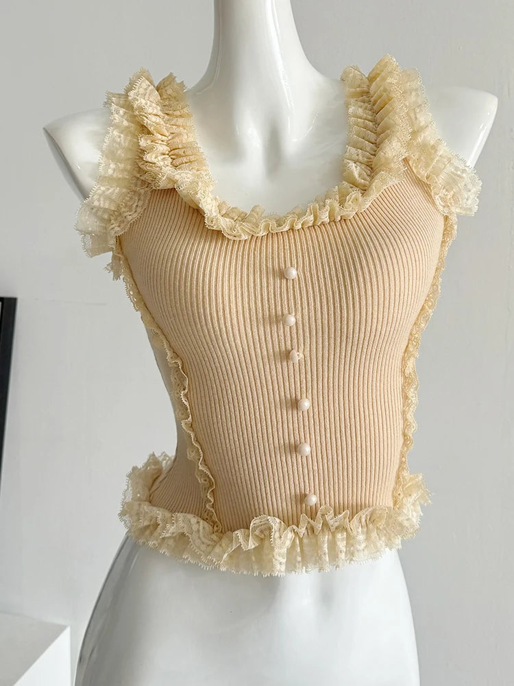 Flirty knit patchwork lace top with ruffles and U-neck collar