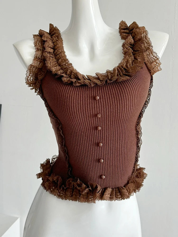 Flirty knit patchwork lace top with ruffles and U-neck collar