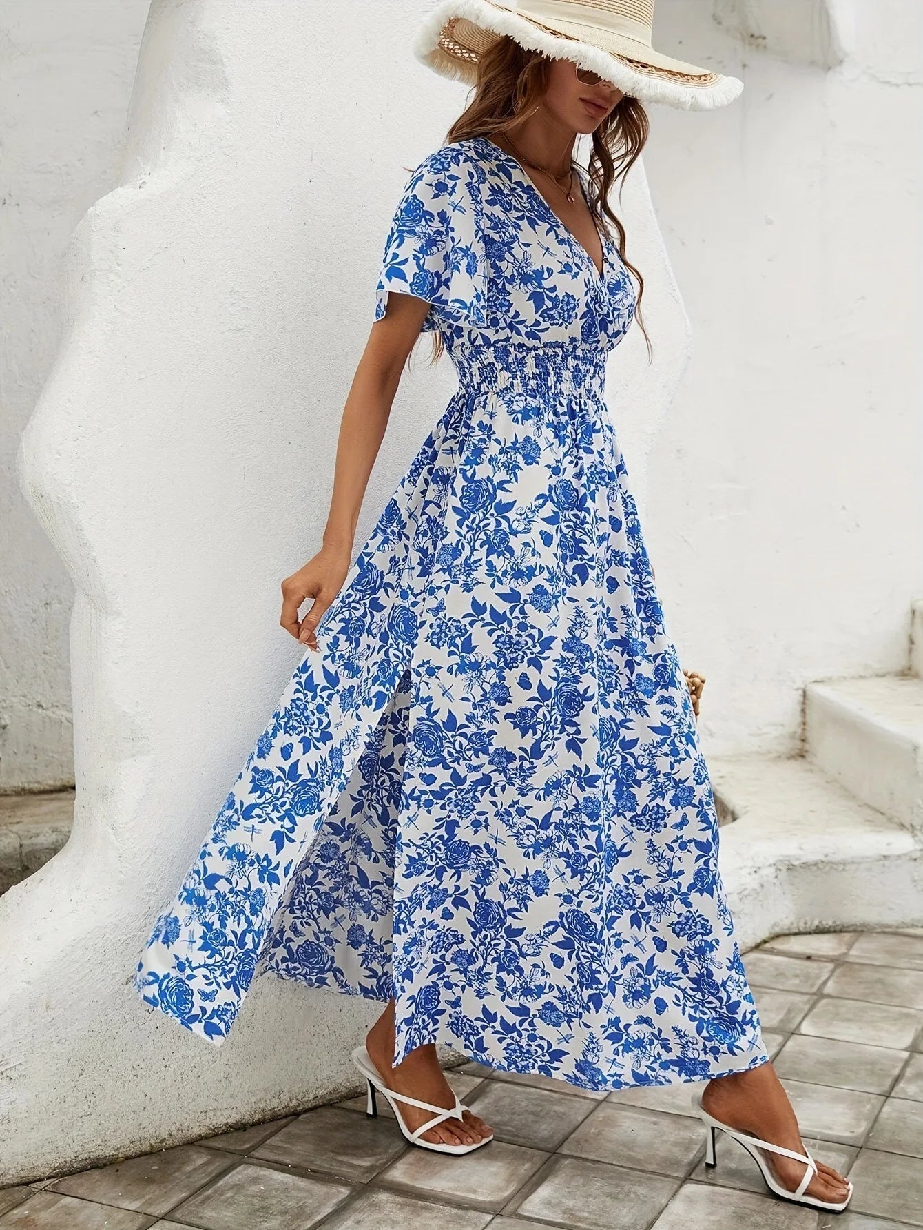 Elegant flowy floral midi dress with side slit, ideal for summer