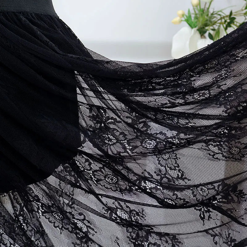 Long gothic high-waisted skirt in transparent lace for evening wear