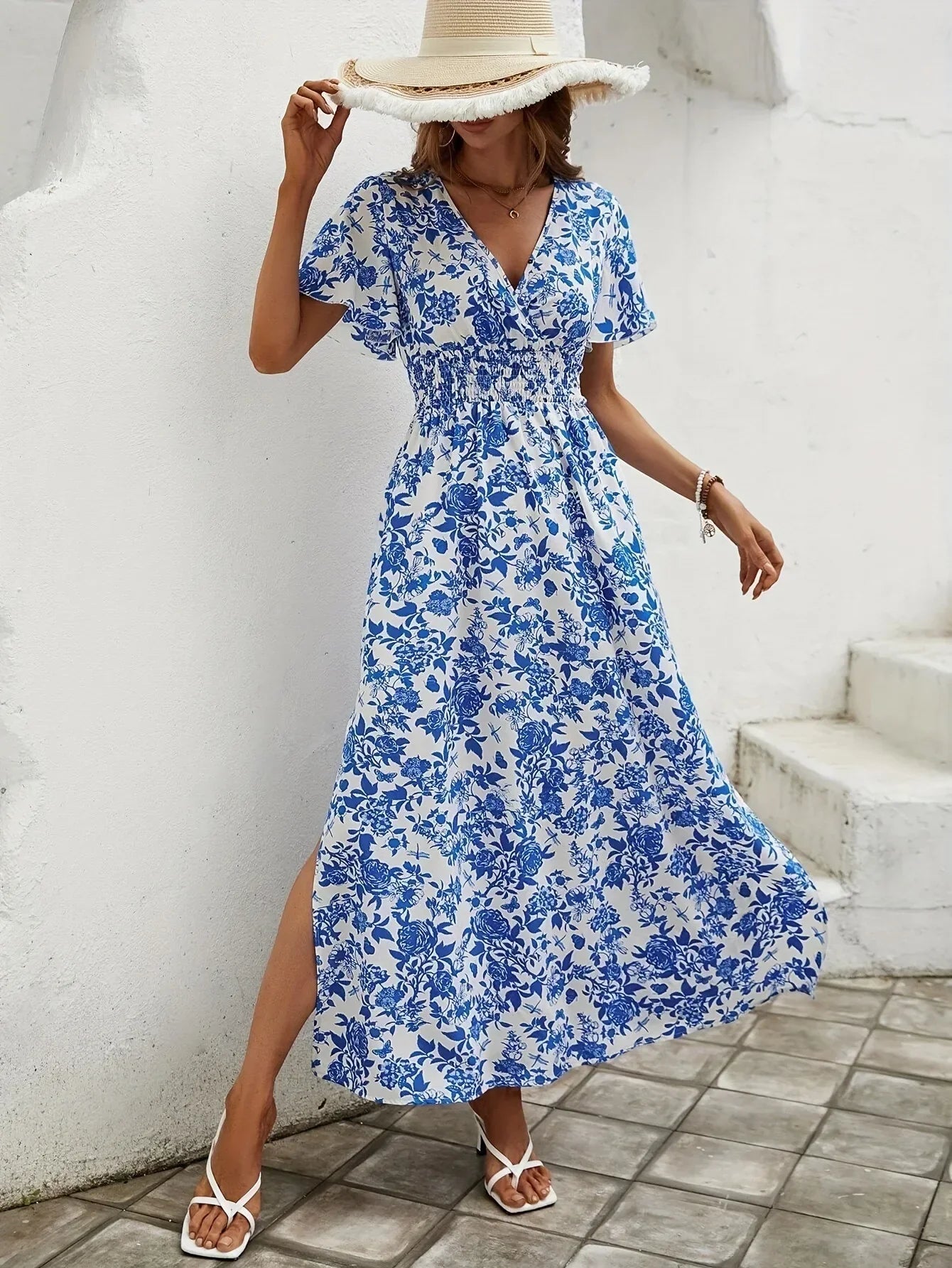 Elegant flowy floral midi dress with side slit, ideal for summer