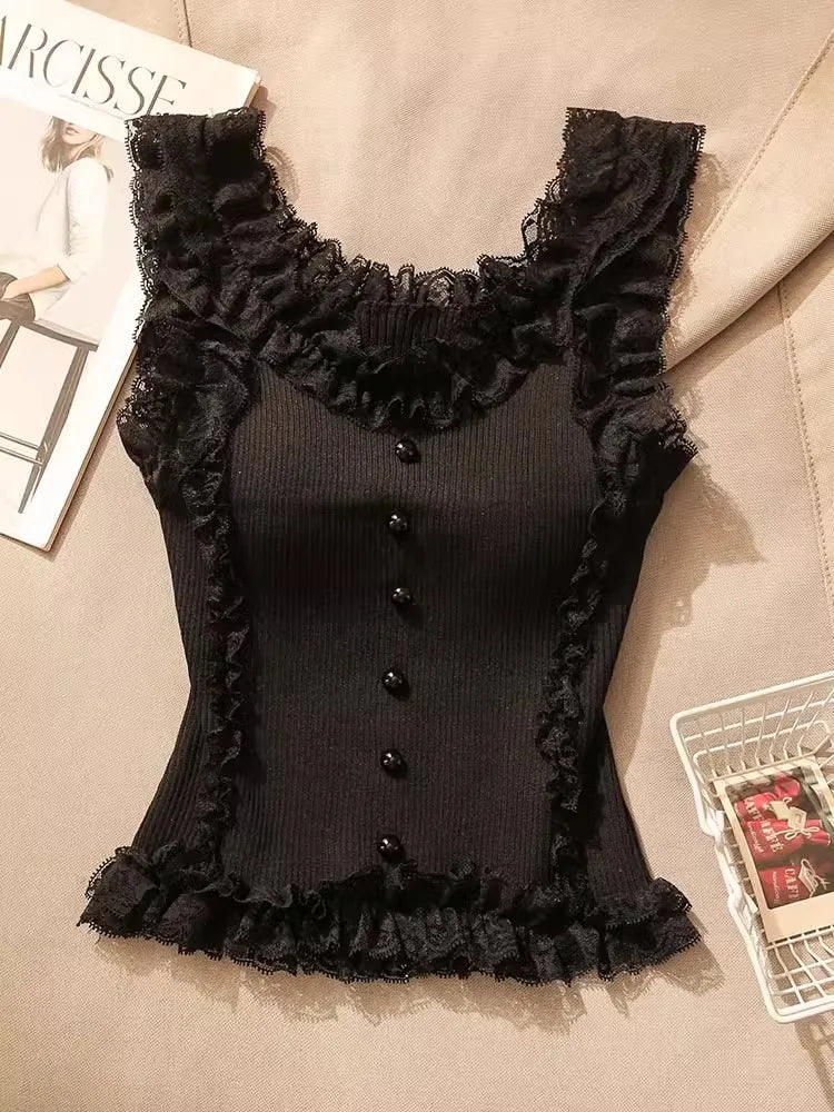 Flirty knit patchwork lace top with ruffles and U-neck collar