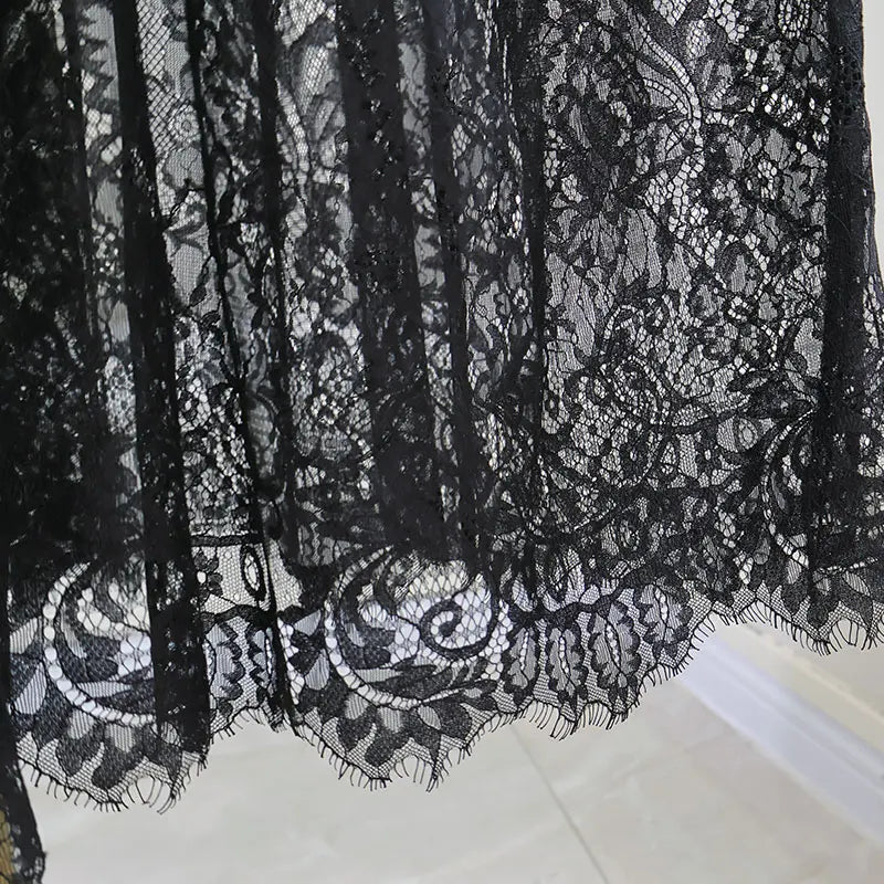Long gothic high-waisted skirt in transparent lace for evening wear