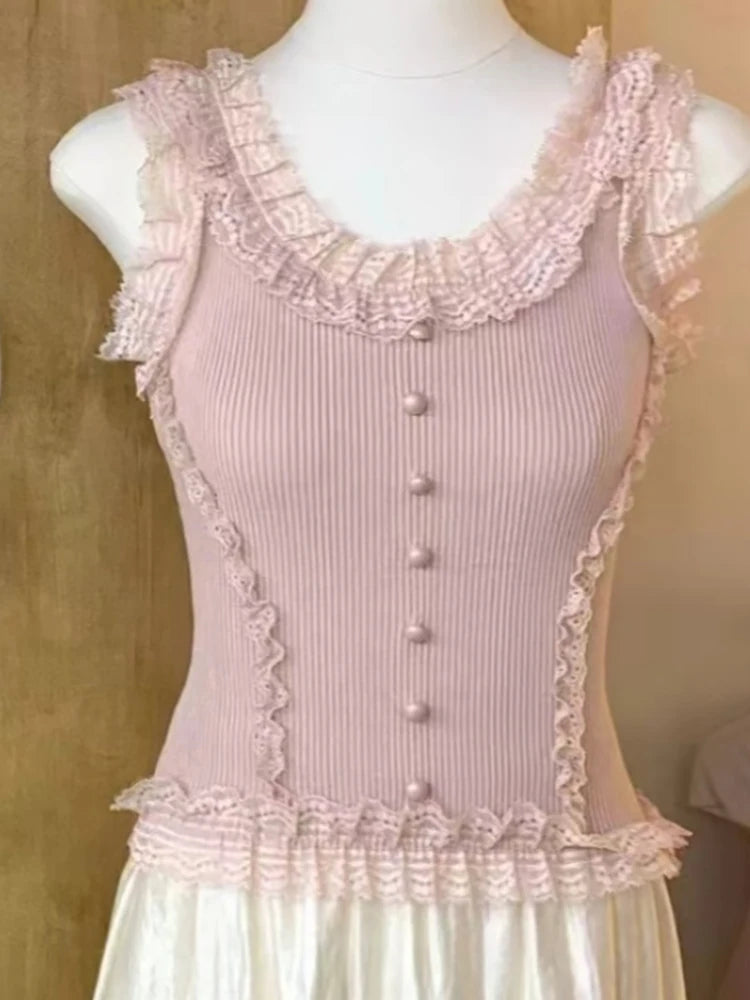 Flirty knit patchwork lace top with ruffles and U-neck collar