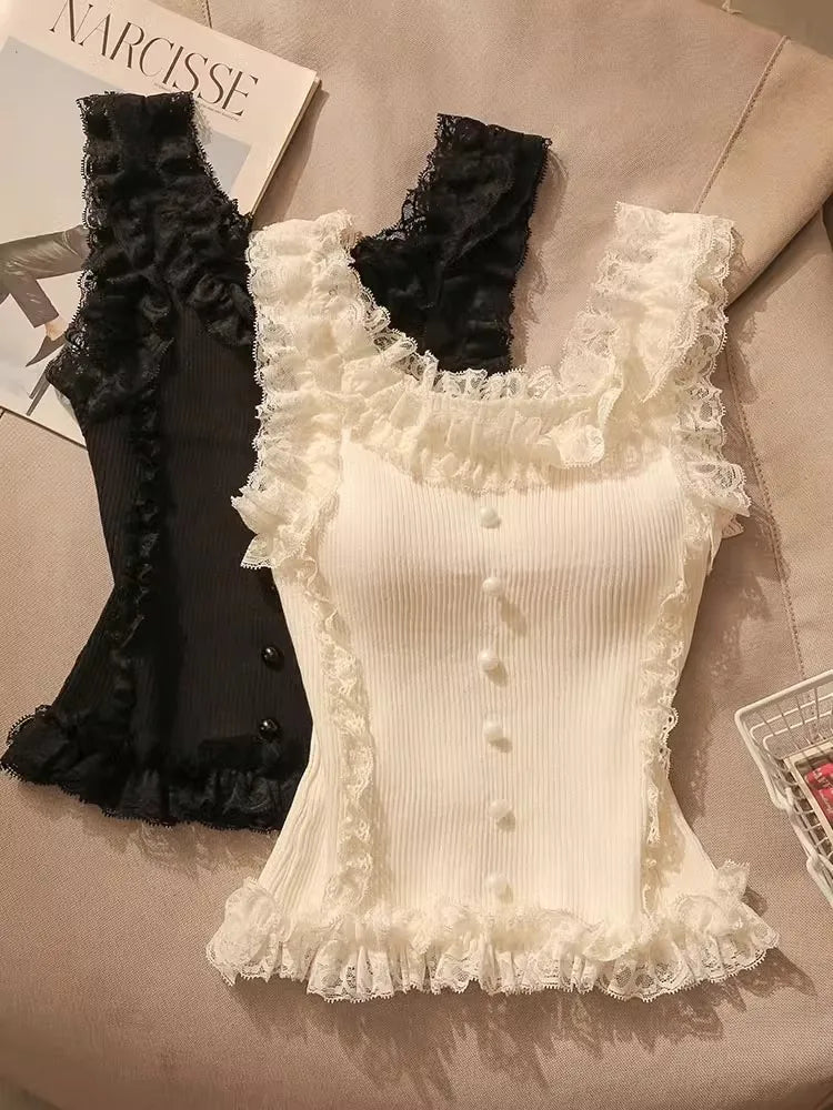 Flirty knit patchwork lace top with ruffles and U-neck collar