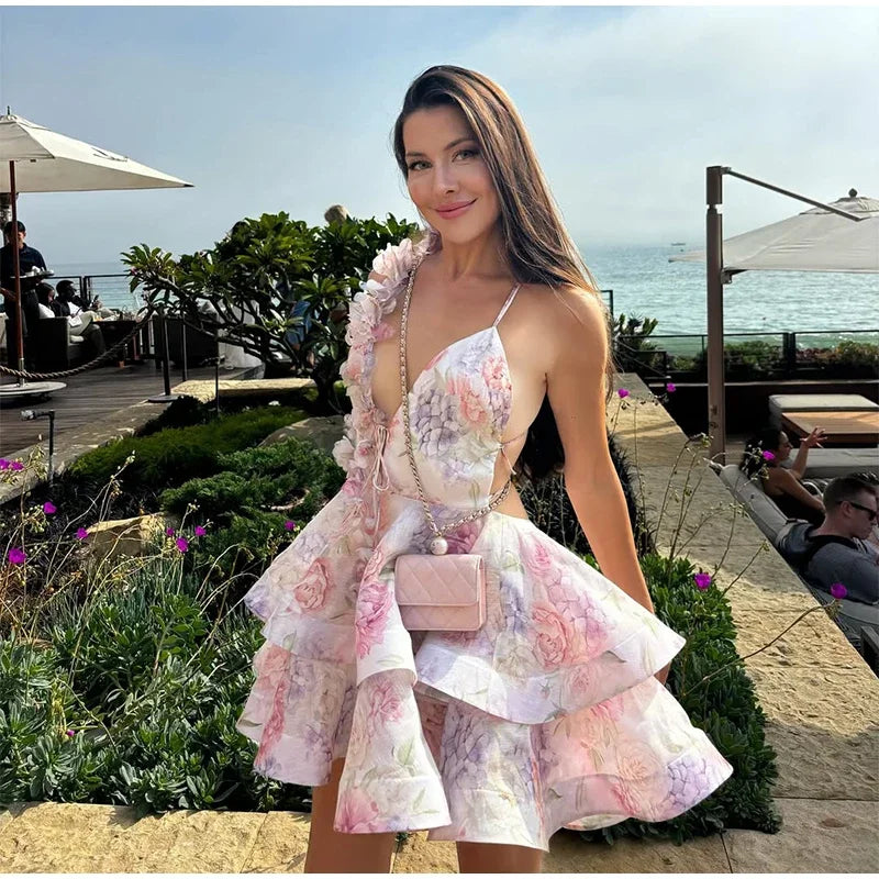 Mini halter backless dress with floral print, ruffles, and deep V-neck collar