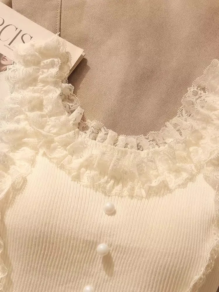 Flirty knit patchwork lace top with ruffles and U-neck collar
