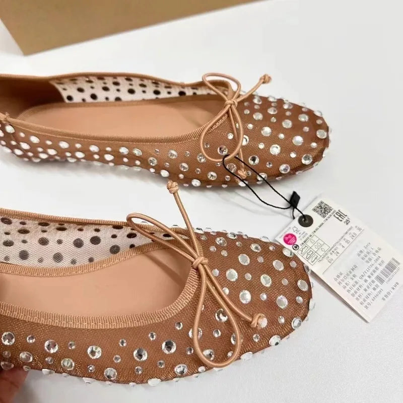Elegant ballerinas adorned with rhinestones, soft and chic design for women
