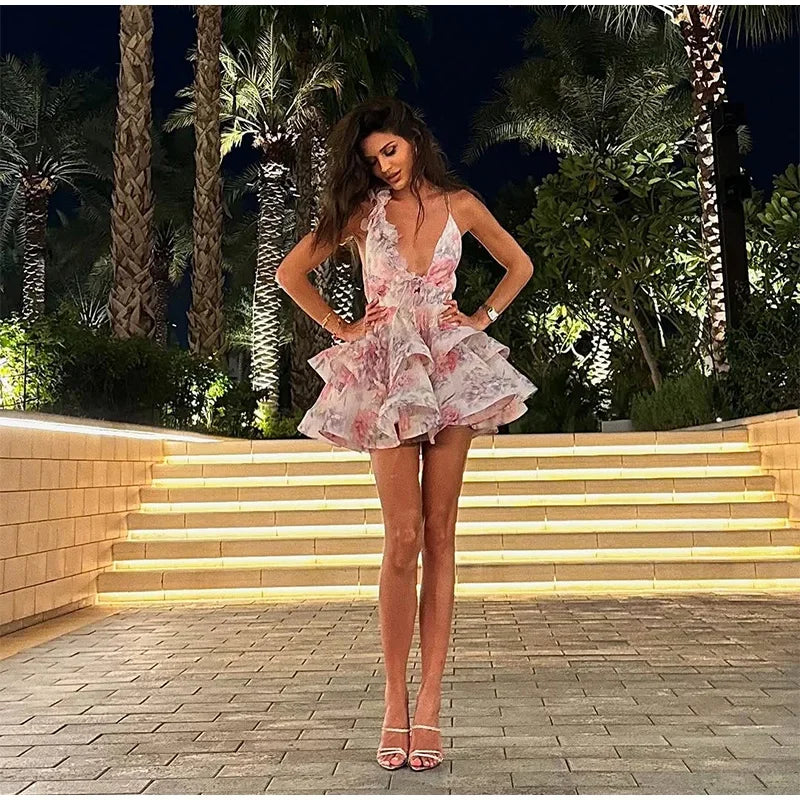 Mini halter backless dress with floral print, ruffles, and deep V-neck collar