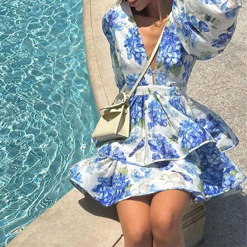 Dress with flounced hem, puff sleeves, and V-neck floral print for women