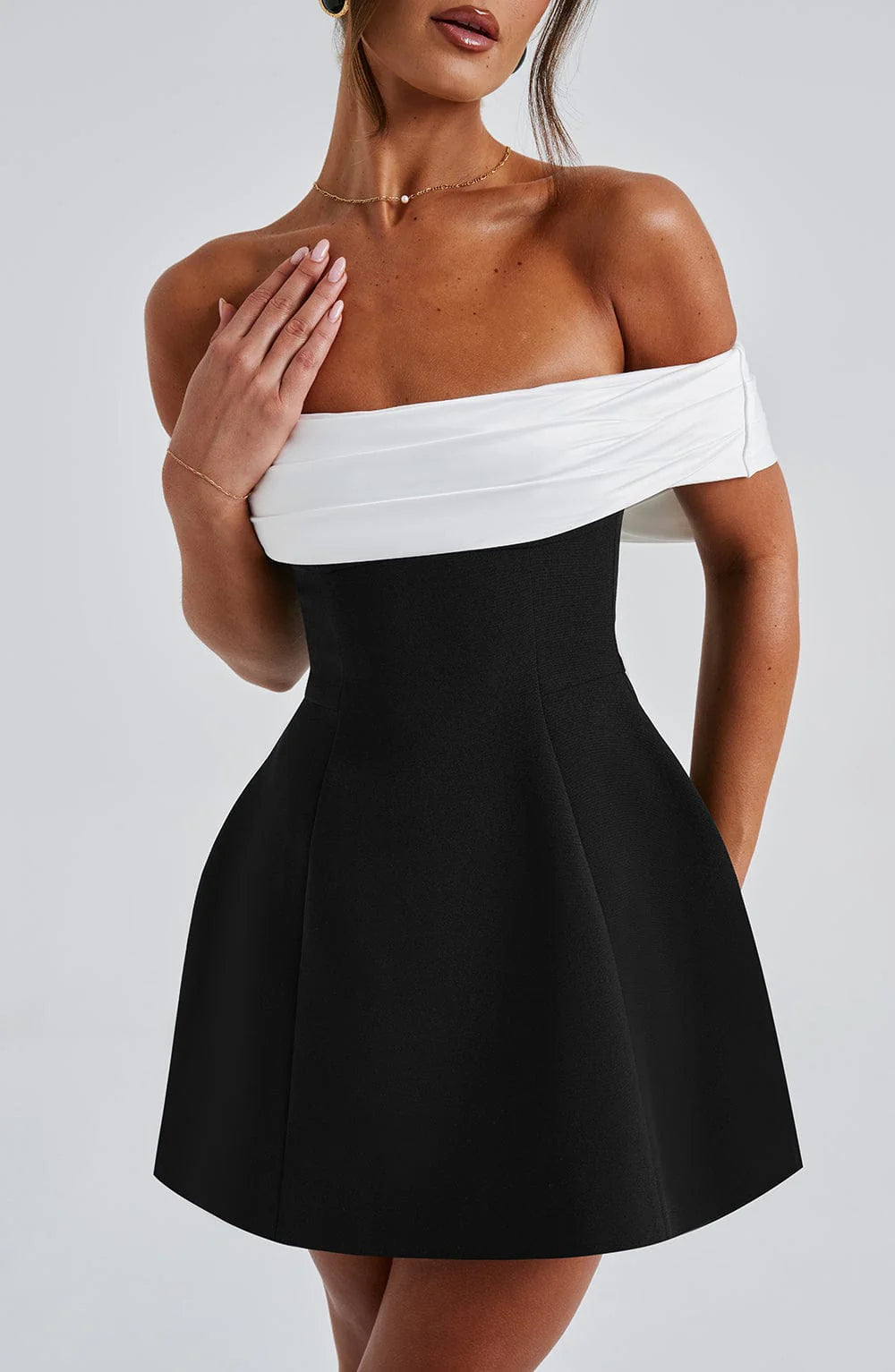 Yvonne | Bardot neckline mini dress with contoured bubble skirt