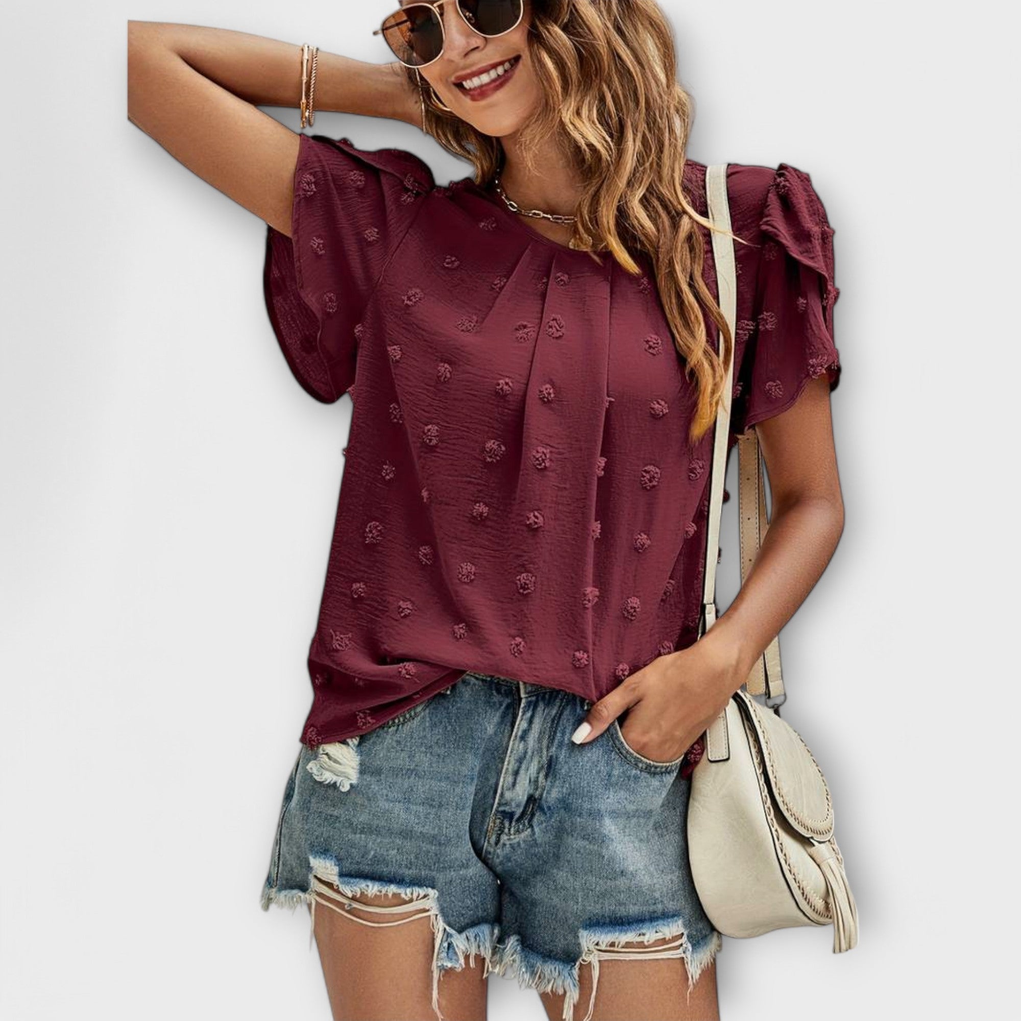 Blouse à pois et manches fleuries – Élégance féminine chic