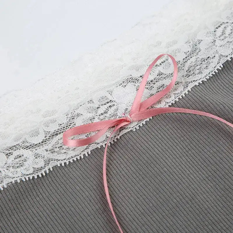 Flirty aesthetic top with bare shoulders and lace trim for women