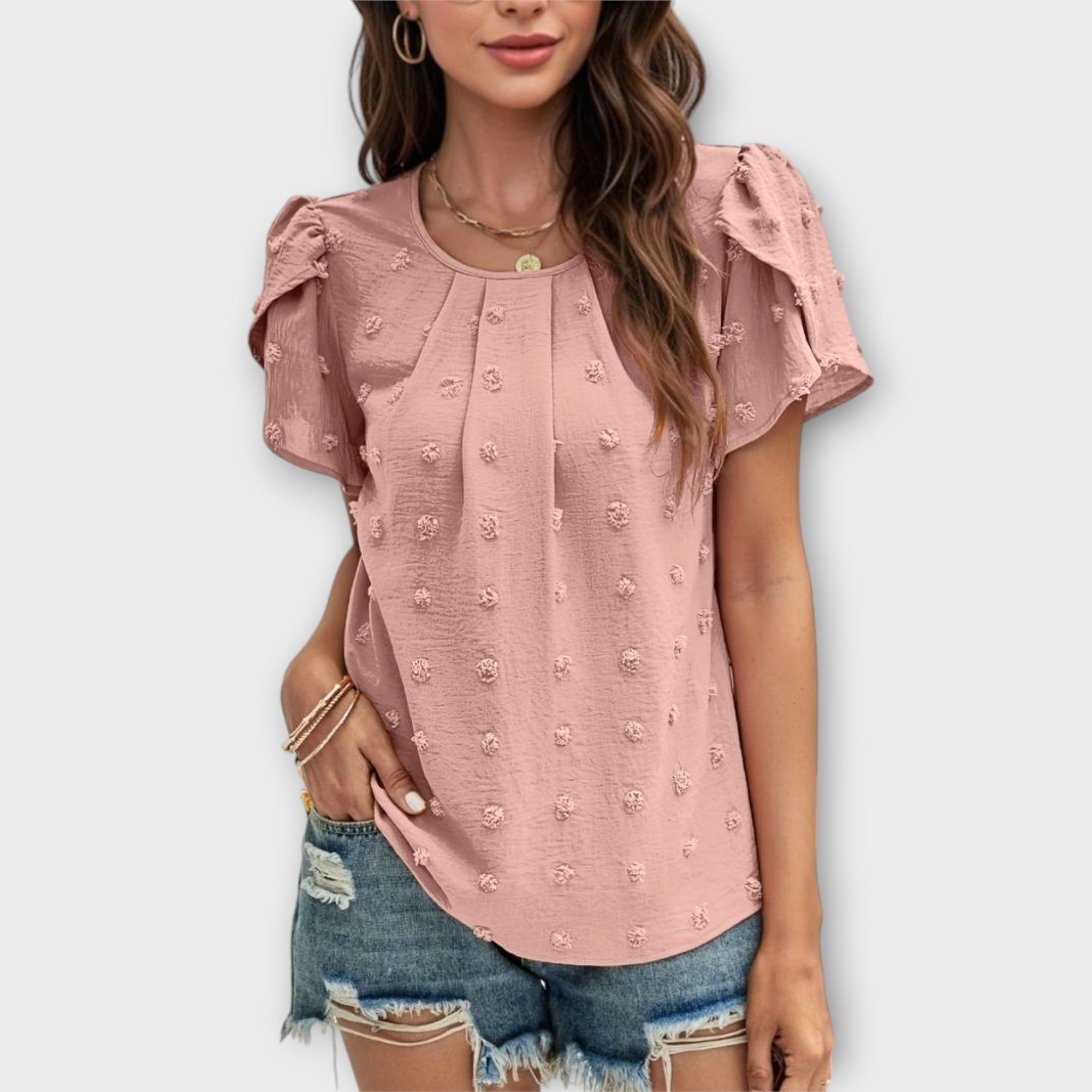 Blouse à pois et manches fleuries – Élégance féminine chic