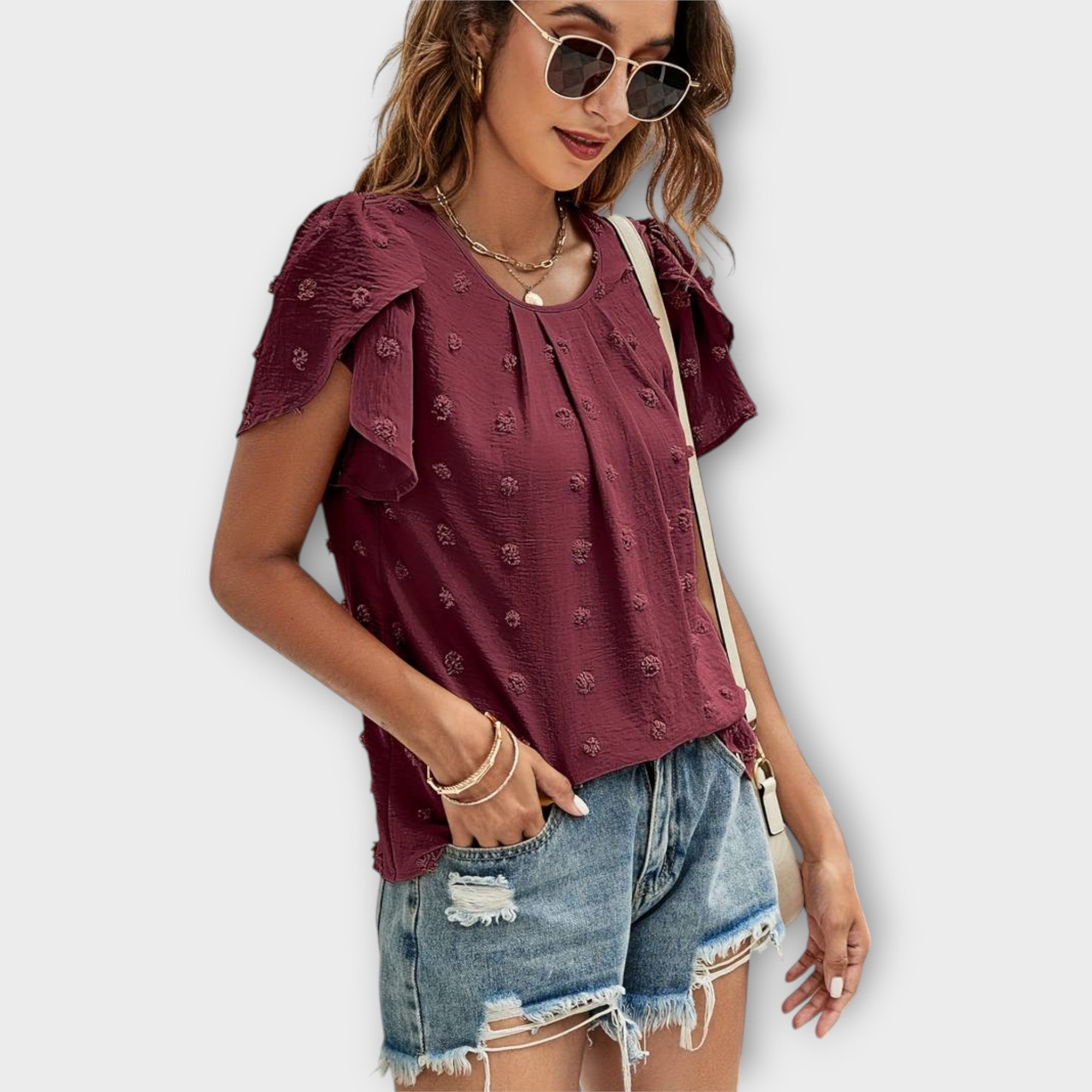 Blouse à pois et manches fleuries – Élégance féminine chic