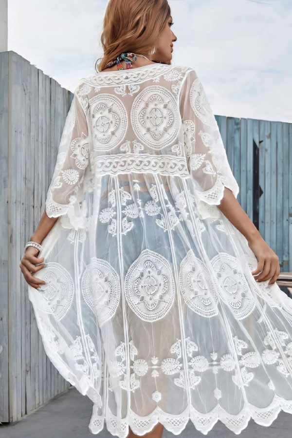 Elegant lace beach cover-ups with a transparent bohemian design