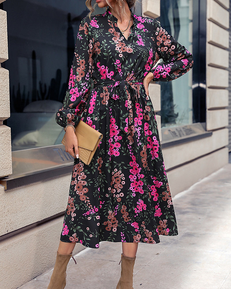 Elegant belted floral midi dress with V-neck and long sleeves for women