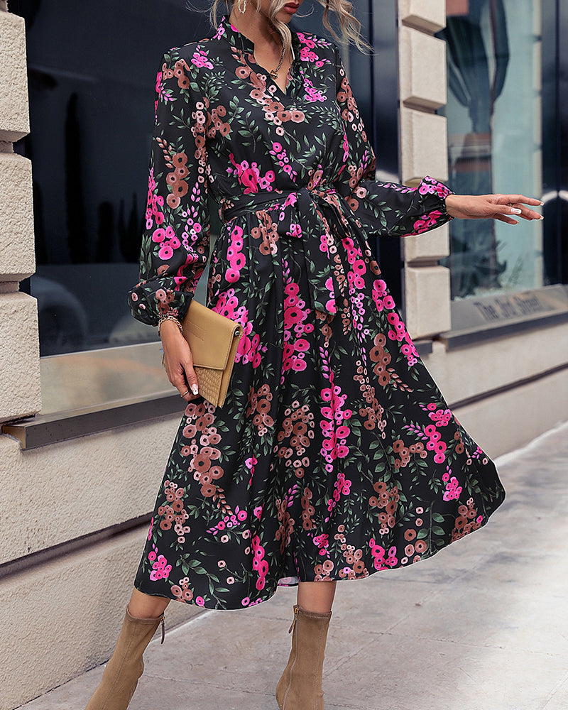 Elegant belted floral midi dress with V-neck and long sleeves for women